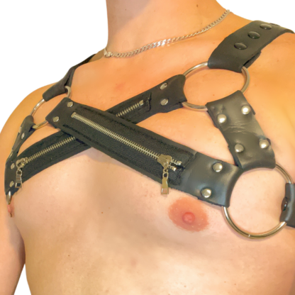 male wearing soft neoprene zip harness with two rings on chest.