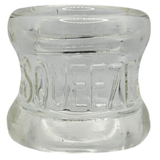 Oxballs Clear silicone ball stretcher with the words squeeze