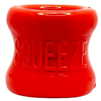 Oxballs Red silicone ball stretcher with the words squeeze