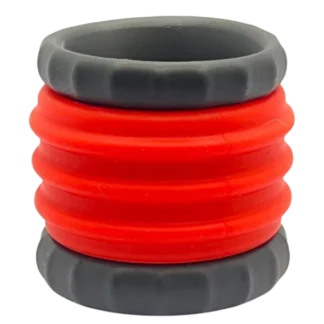 Red and black rubber ring with black handle, dual ball stretcher in red and black color scheme.