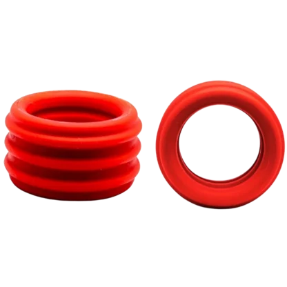 Red ribbed ball stretcher viewed from the front and top.