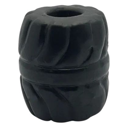 Black rubber ball with small hole, used as a ball stretcher, made of silicone material, very tight fit.