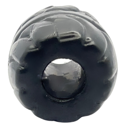 Black rubber ball with small hole, used as a ball stretcher, made of silicone material, very tight fit.